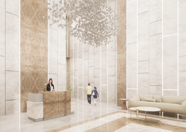 Forbes Fab Luxe Residences lobby lounge with marble and gold walls and reception desk